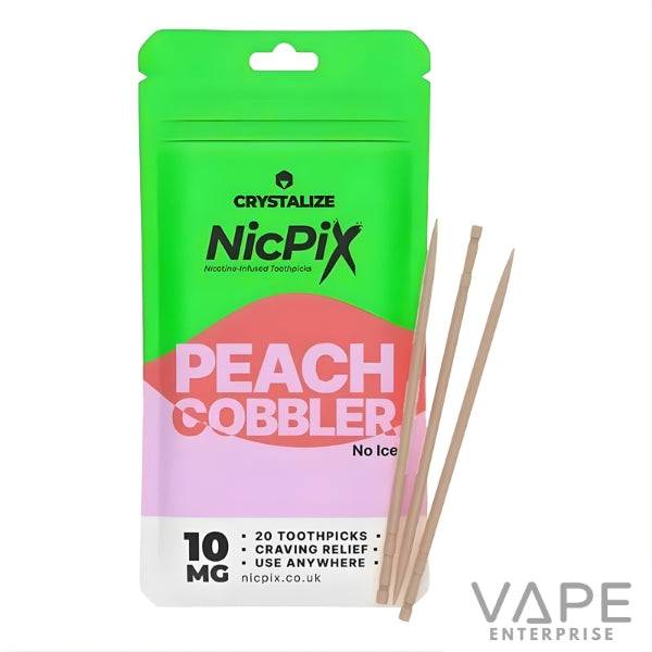 Green and pink NicPix Peach Cobbler nicotine-infused toothpicks package with three wooden toothpicks
