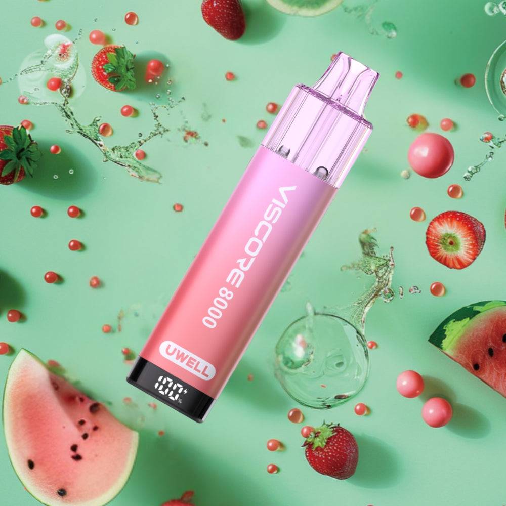 Pink Uwell Viscor 8000 vape device surrounded by watermelon slices and strawberries on green background